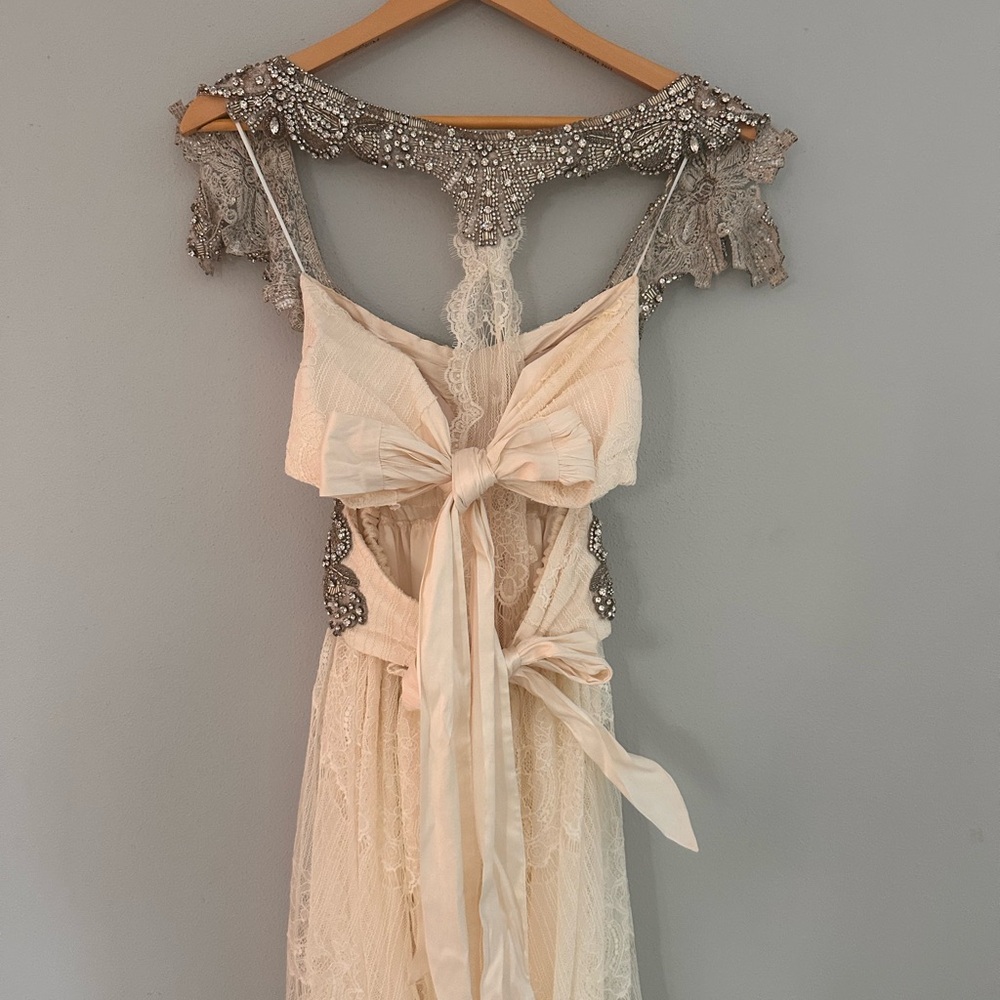 Elegant Cream and Silver Wedding Dress - Picture 3 of 5